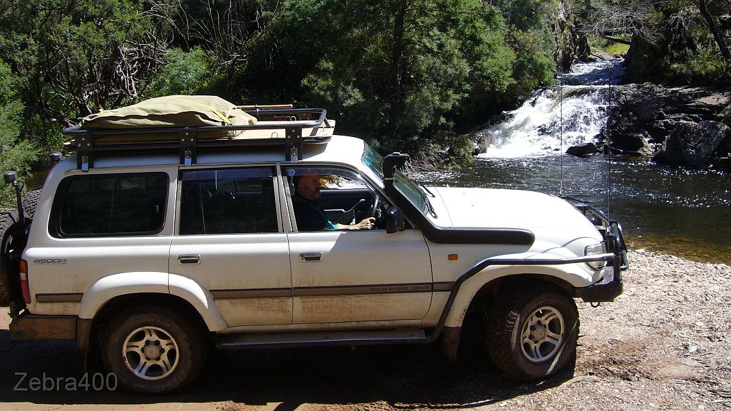 19-Gerry in Gerry Gee admires Harrisons Cutting on the Dargo River.jpg